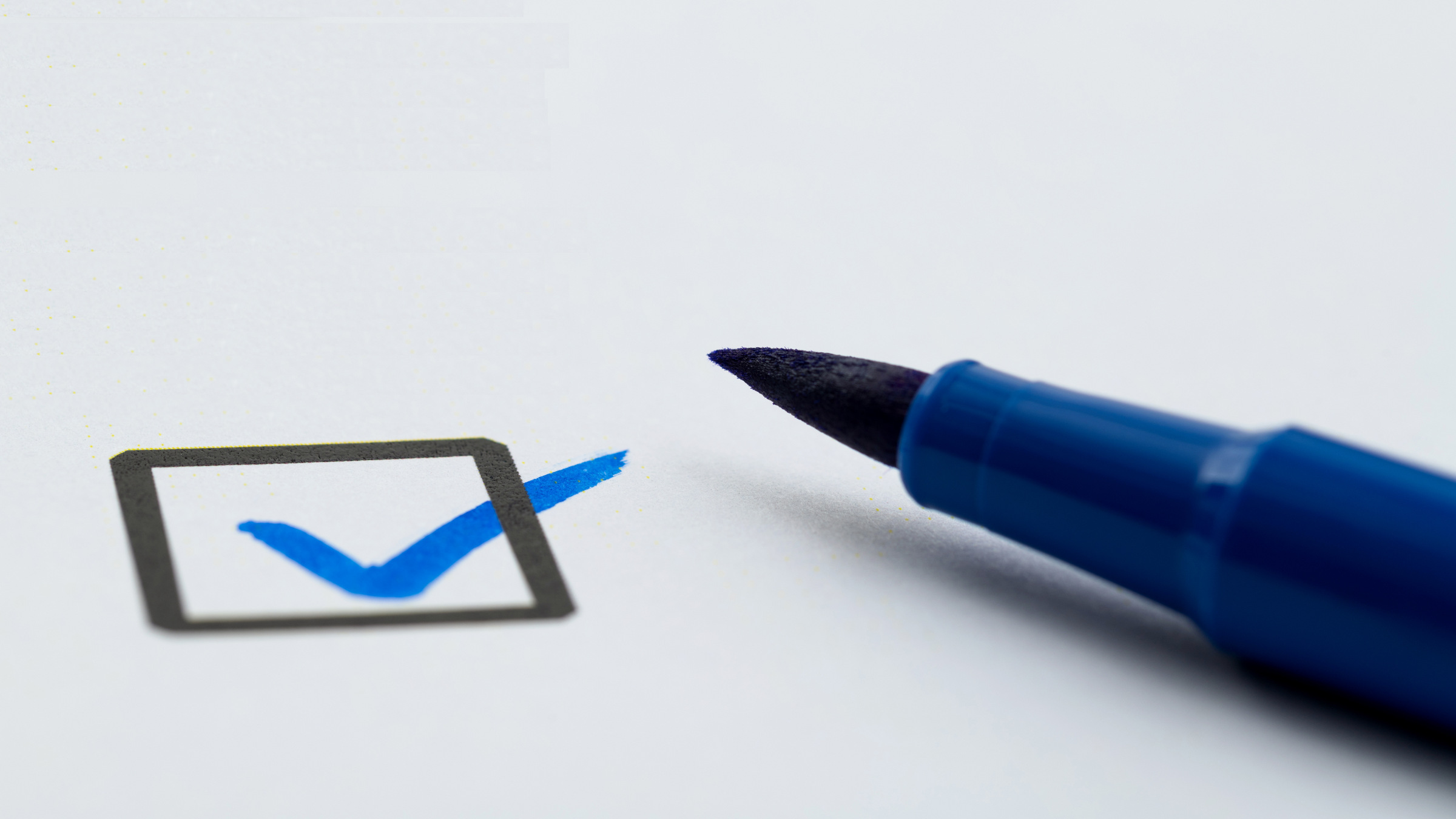 blue pen and checkbox